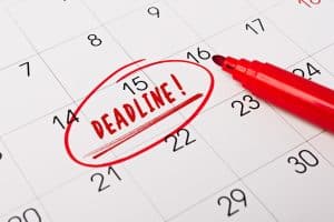 close up of a calendar with a deadline circled
